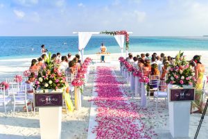 Walking Down the Aisle rose petals on beach